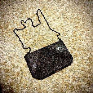 Evening purse with over the shoulder or a clutch.